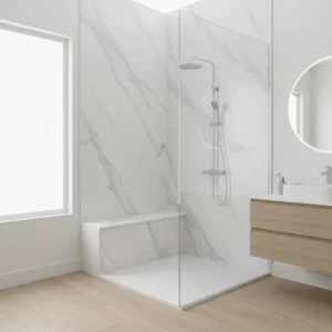 A modern walk-in shower conversion with smooth, solid-surface white marble-patterned acrylic walls. The shower features a low-profile entry, a sleek chrome showerhead, and a built-in corner seat. The bathroom floor is a light wood-look waterproof plank. There are no tiles, no grout lines, no free-standing bathtubs, and no text in the image. High-end, clean, and bright residential bathroom interior.